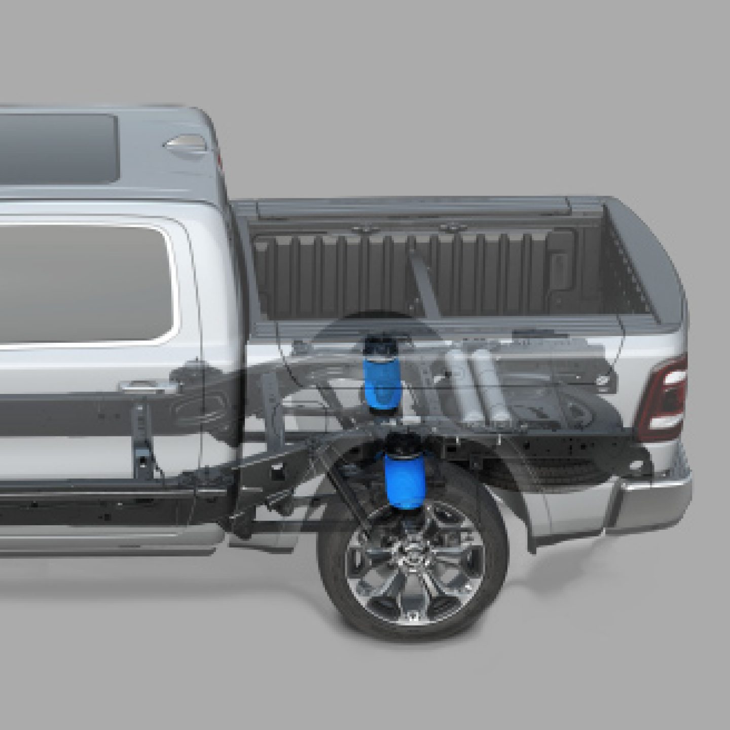 An under-the-skin illustration of a 2020 Ram 1500 highlighting the rear components of the Active-Level Four Corner Air Suspension.