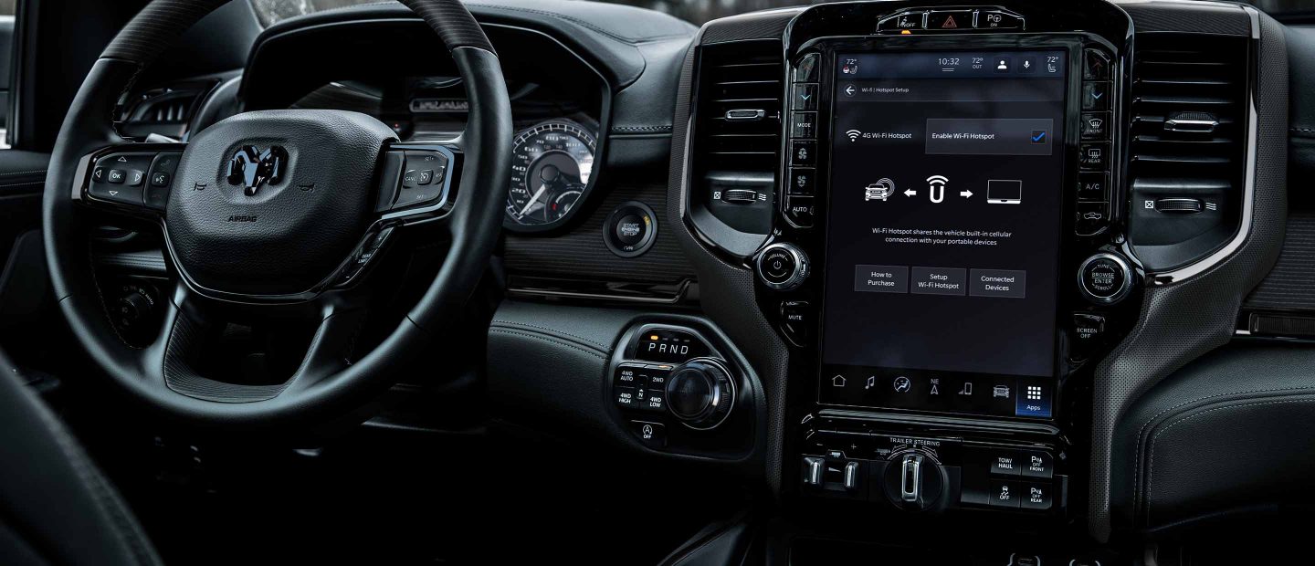 The Uconnect touchscreen in the 2022 Ram 1500 displaying instructions for connecting portable devices to the vehicle's Wi-Fi.